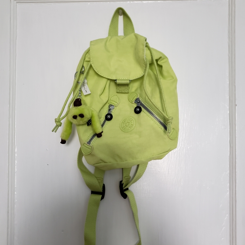 Mini bright green drawstring Kipling backpack